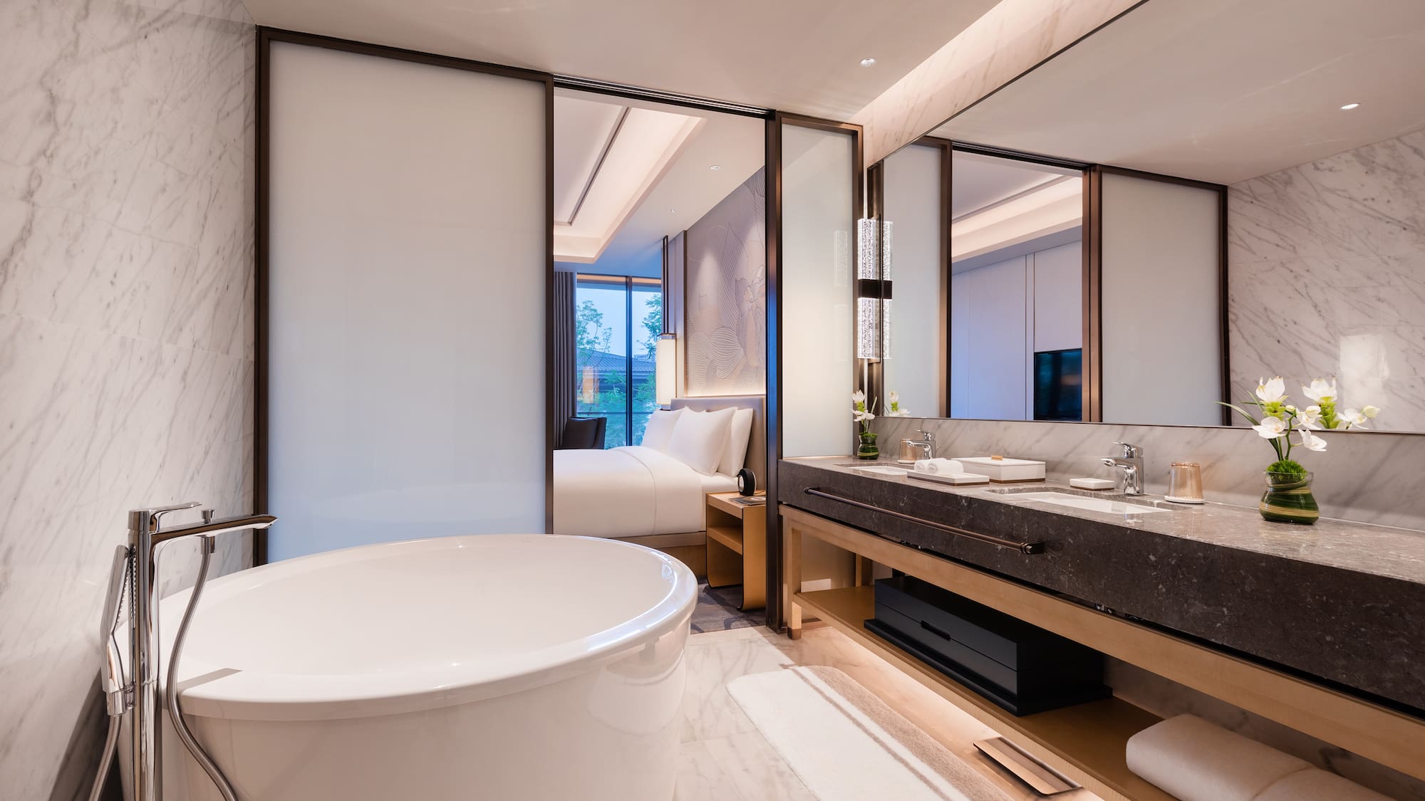 a bathroom with a tub and sink