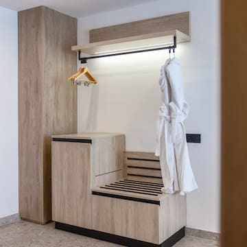 a white robe on a rack