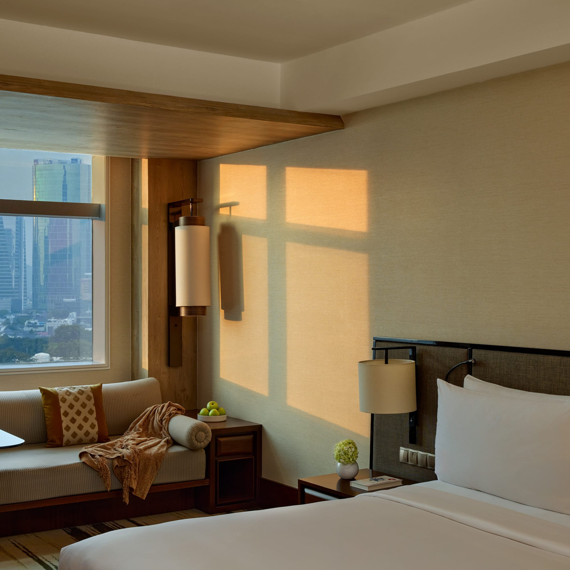 a room with a bed and a window