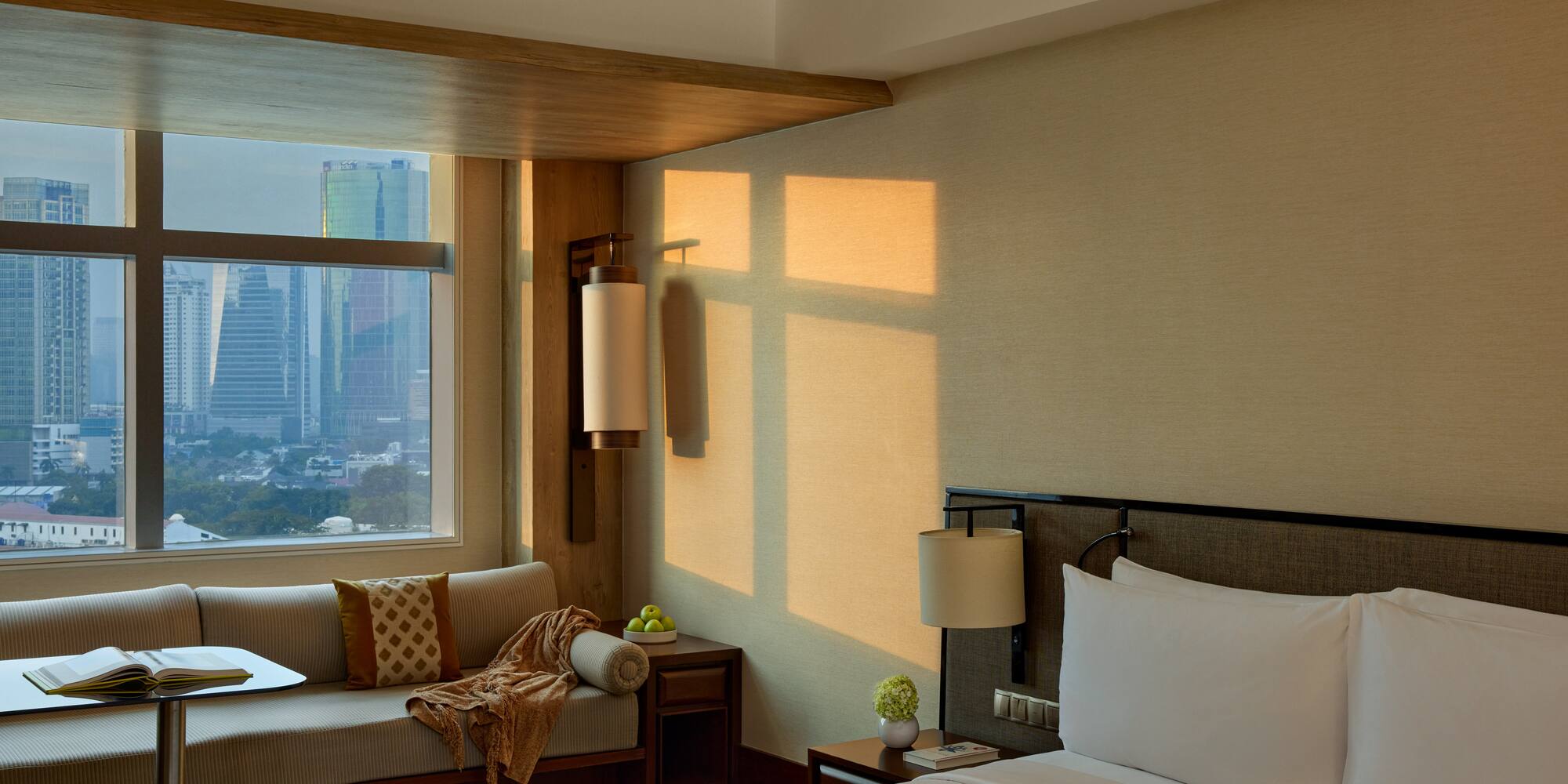 a room with a bed and a window