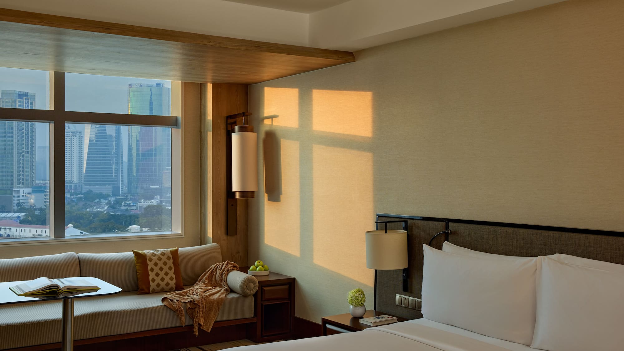 a room with a bed and a window