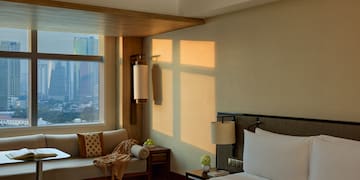 a room with a bed and a window