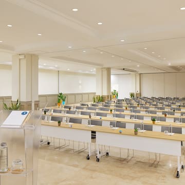 a room with tables and chairs