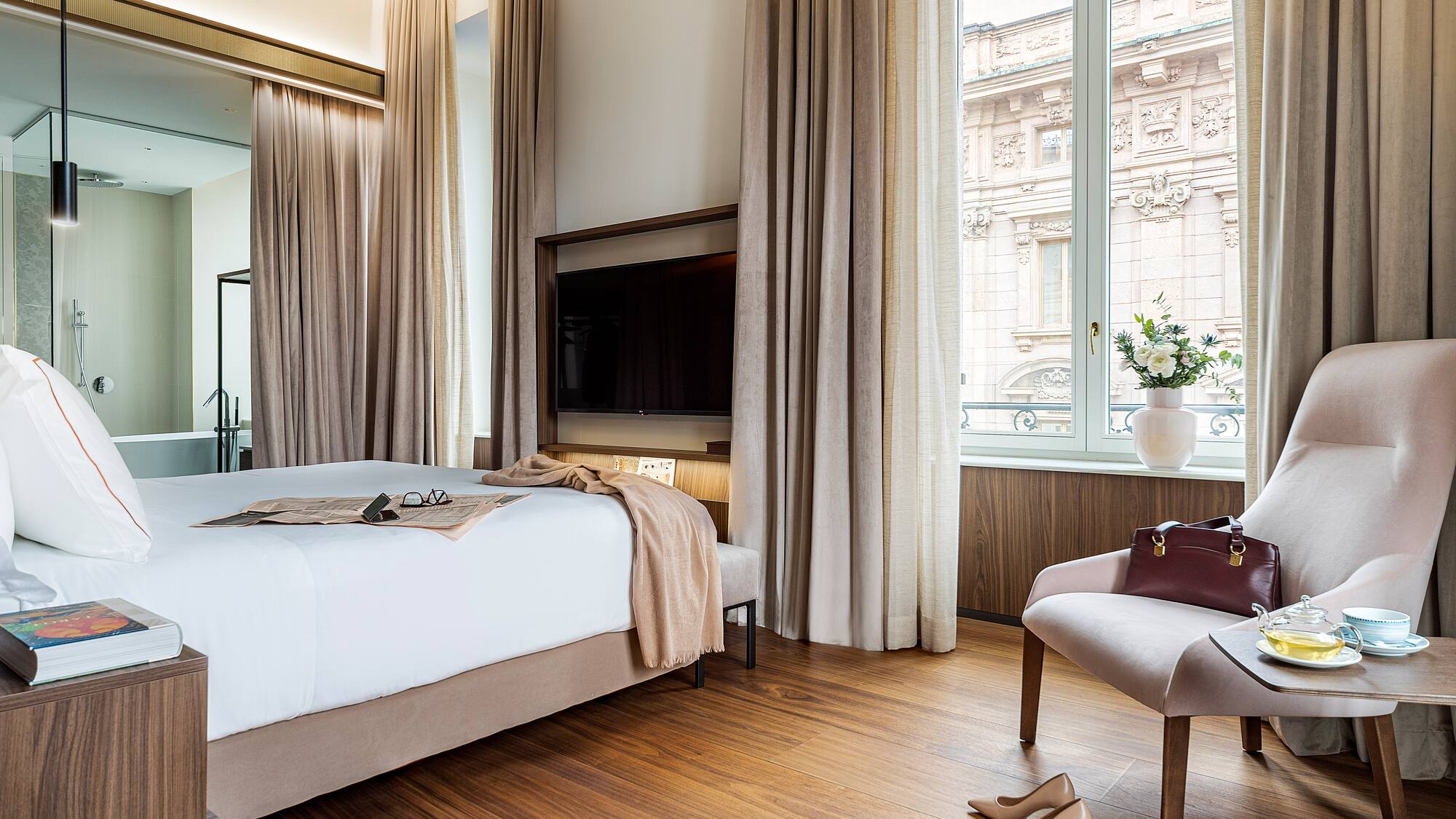 a room with a bed and a chair