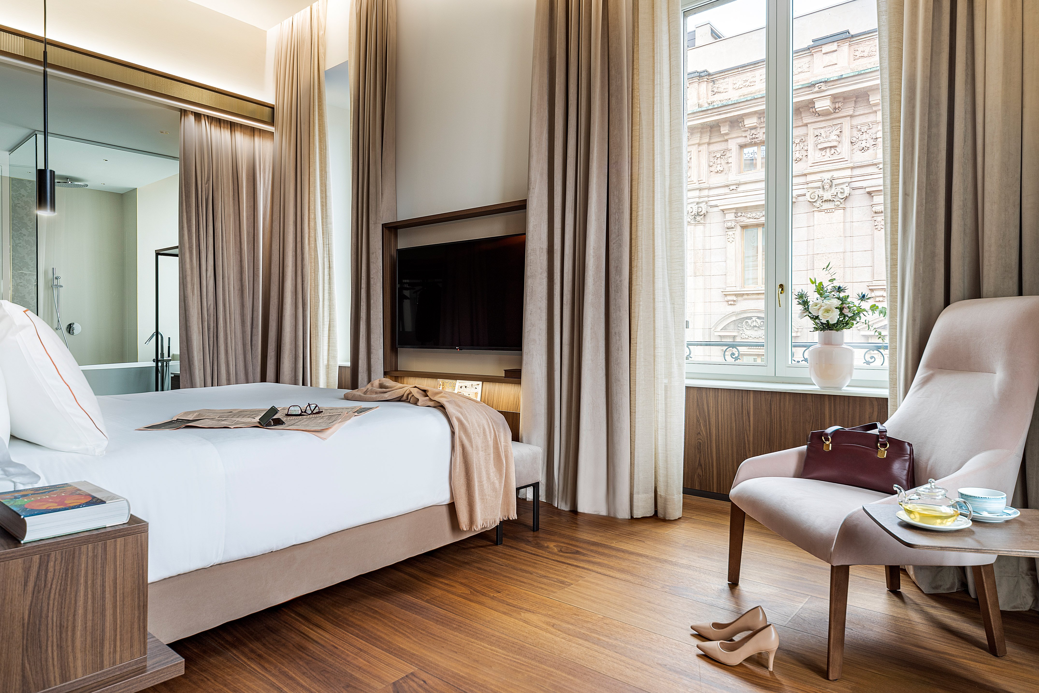 a room with a bed and a chair