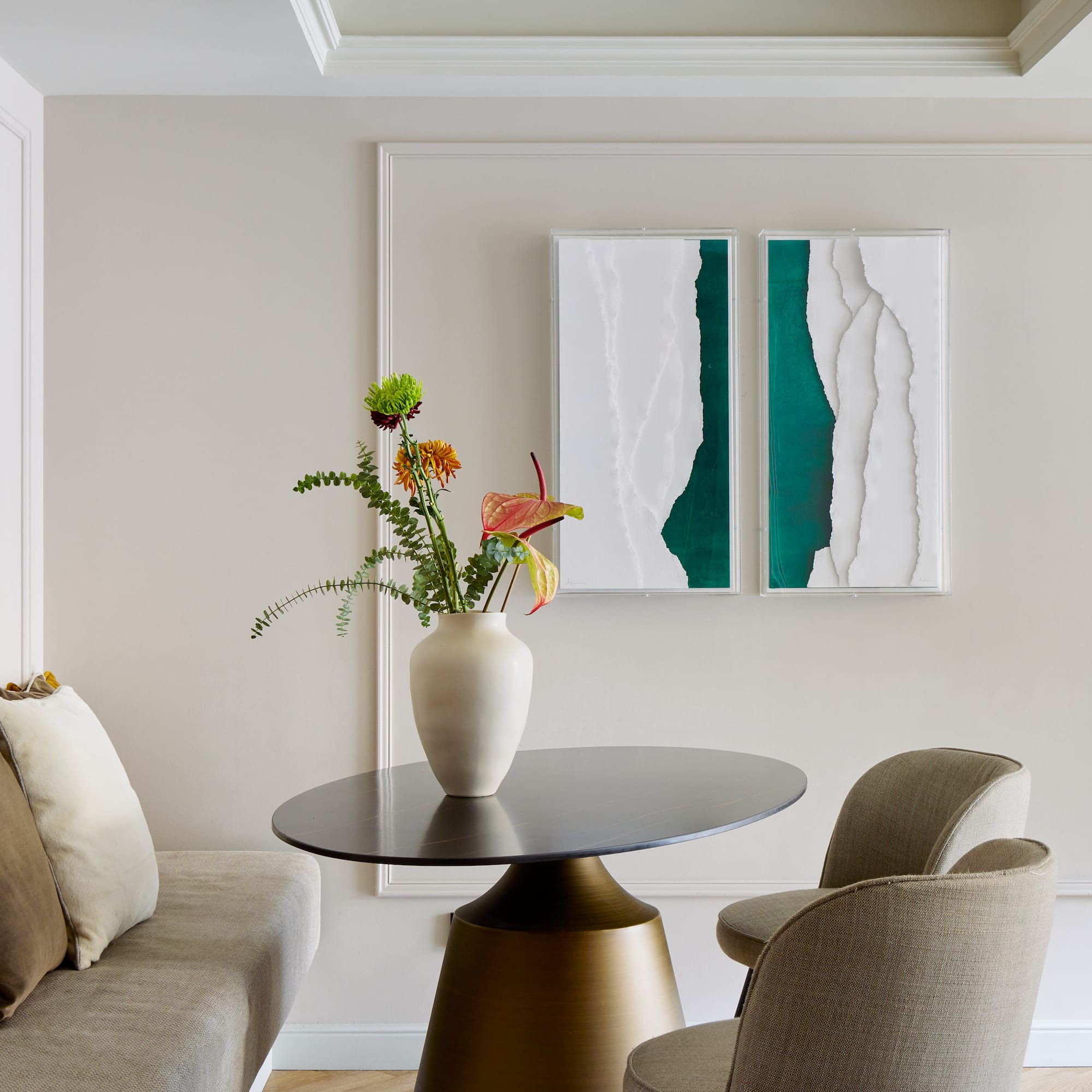 a vase of flowers on a table in a room