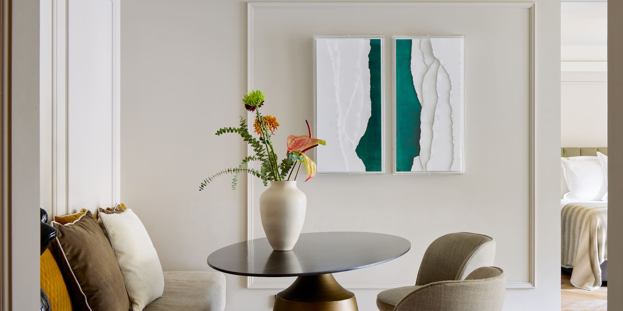 a vase of flowers on a table in a room