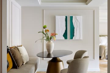 a vase of flowers on a table in a room