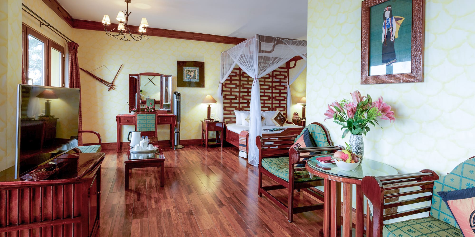 a room with a bed and a mirror