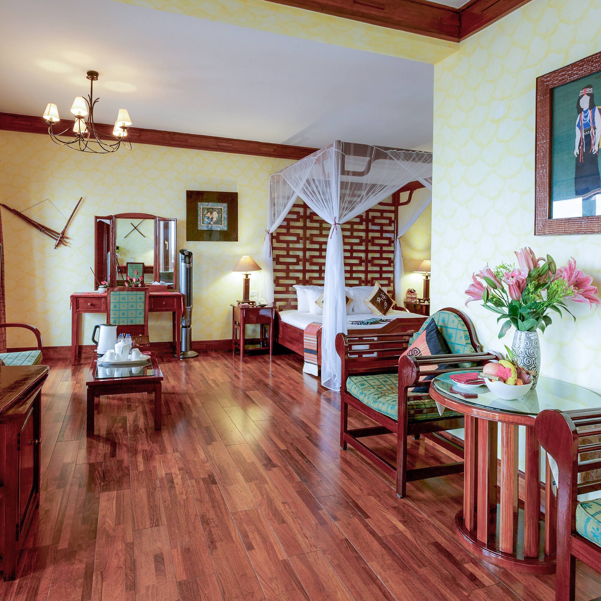 a room with a bed and a mirror