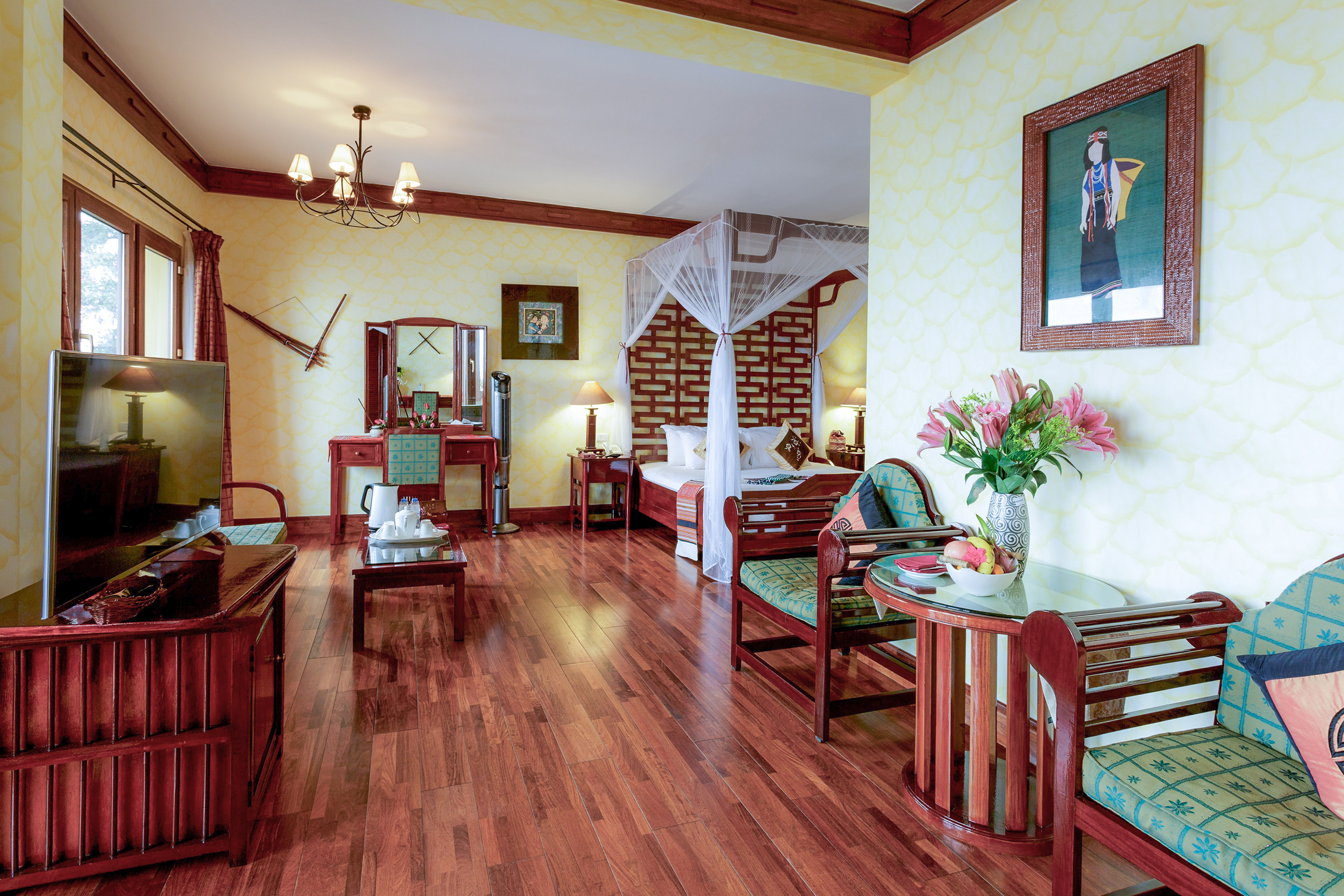 a room with a bed and a mirror