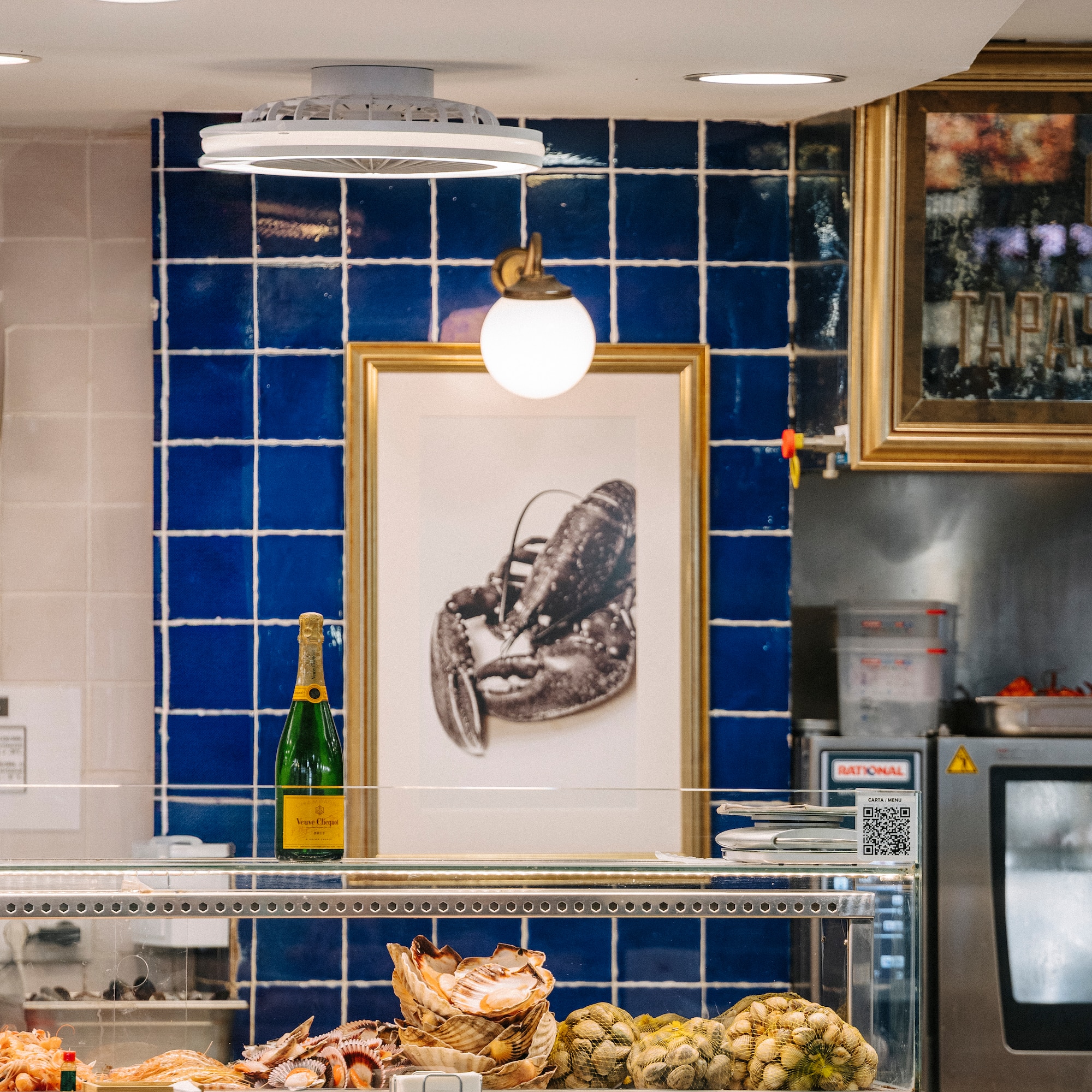 a picture of a lobster on a wall