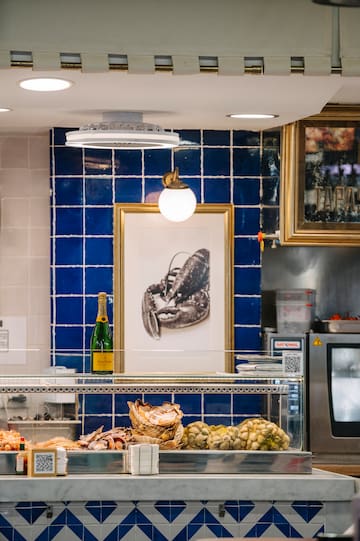 a picture of a lobster on a wall