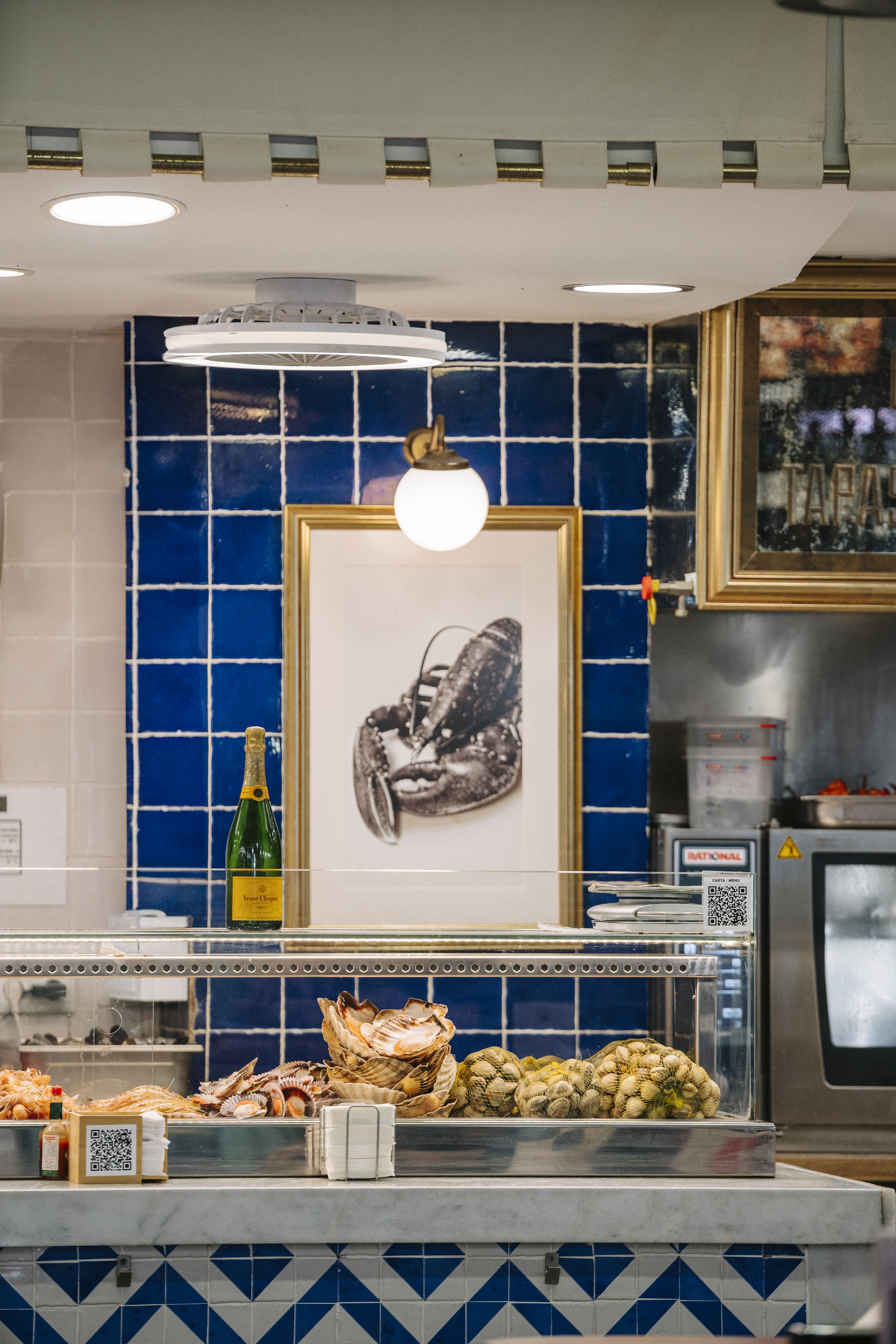 a picture of a lobster on a wall