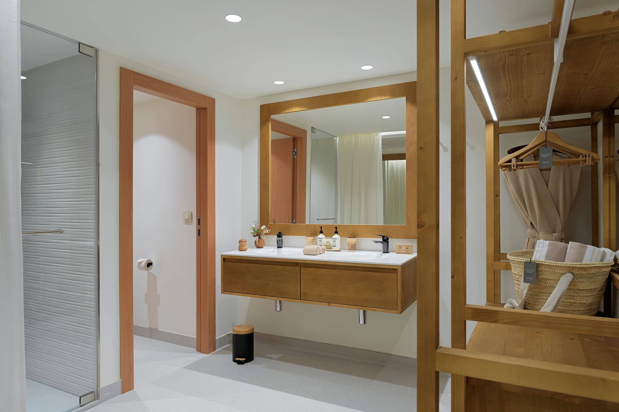 a bathroom with a mirror and sink