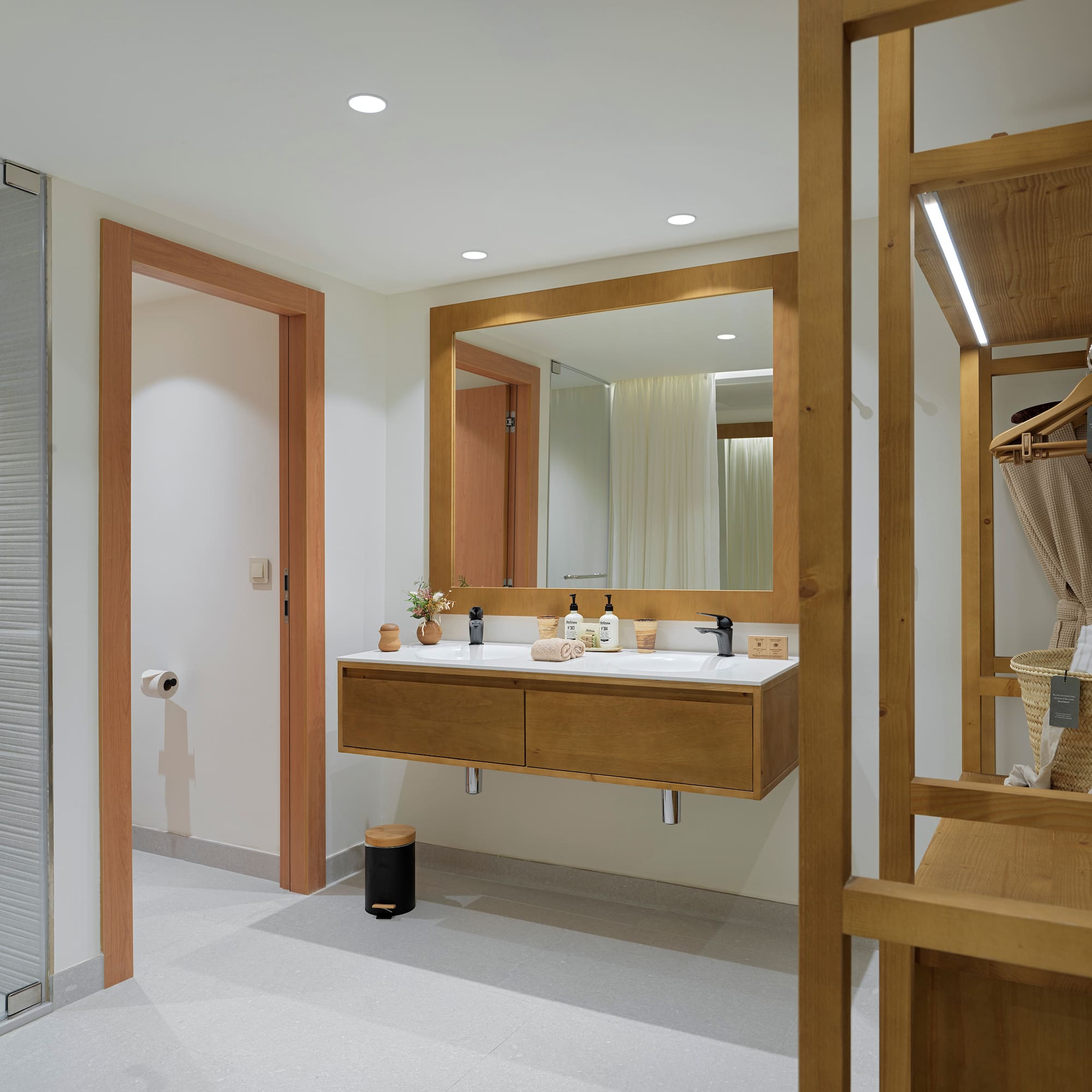 a bathroom with a mirror and sink