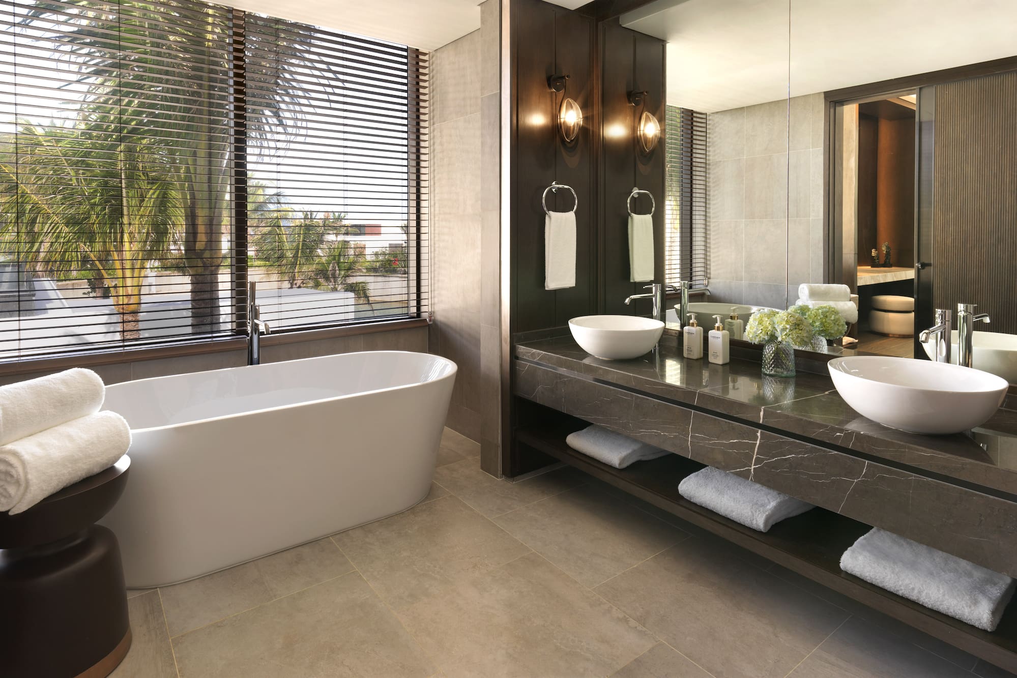 a bathroom with a tub and sink