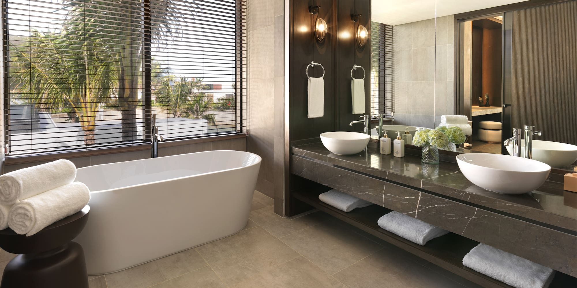 a bathroom with a tub and sink