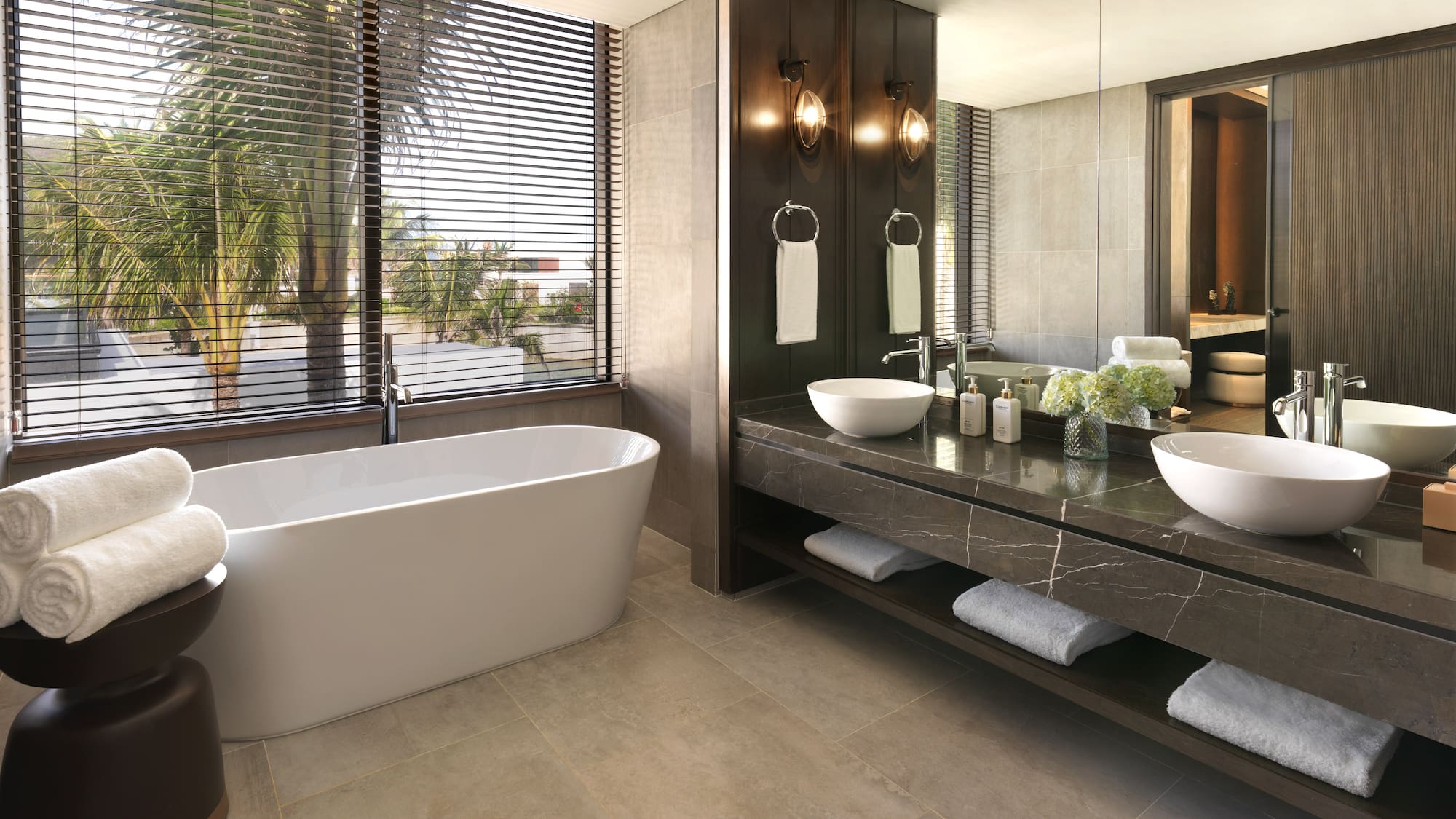 a bathroom with a tub and sink