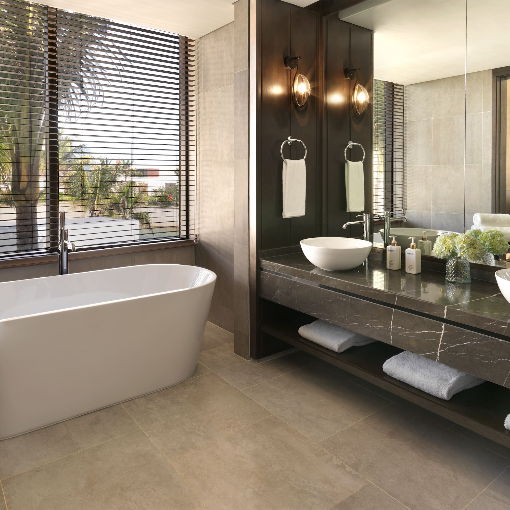 a bathroom with a tub and sink