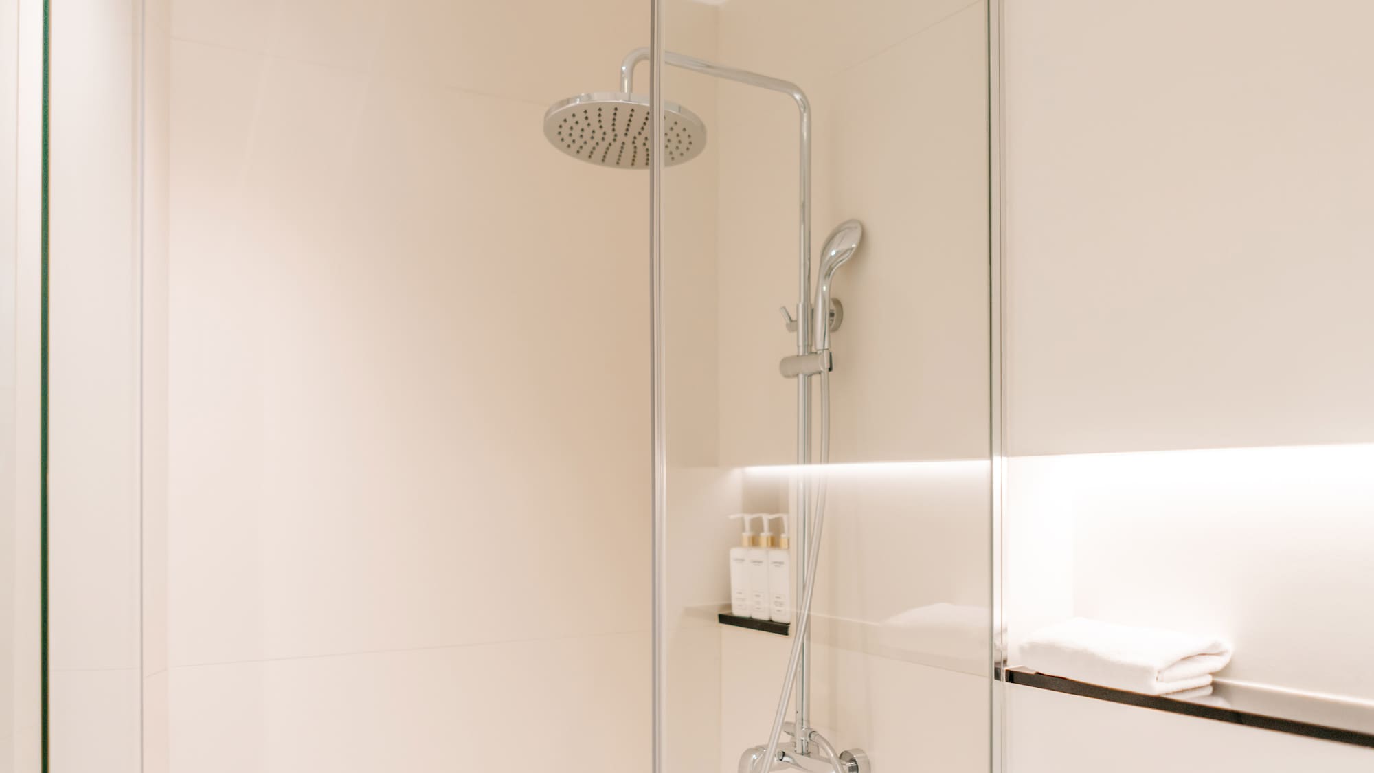 a shower with a glass door