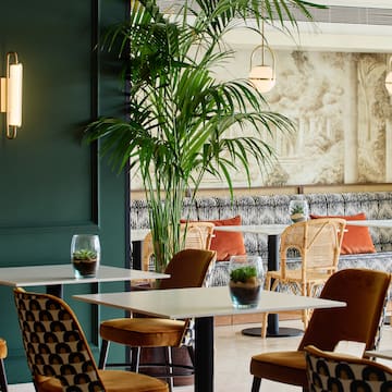 a room with tables and chairs