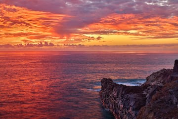 a sunset over the ocean