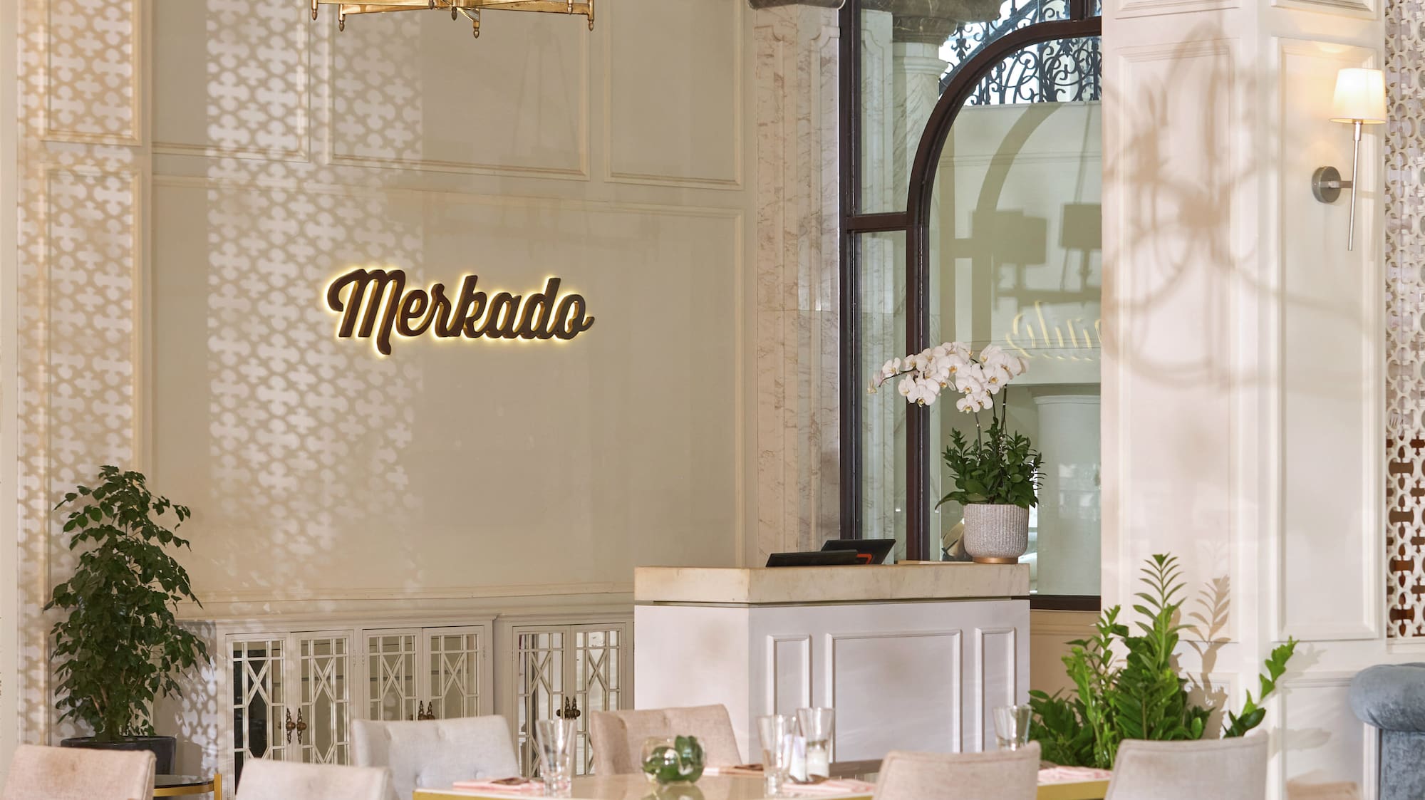 a room with tables and chairs