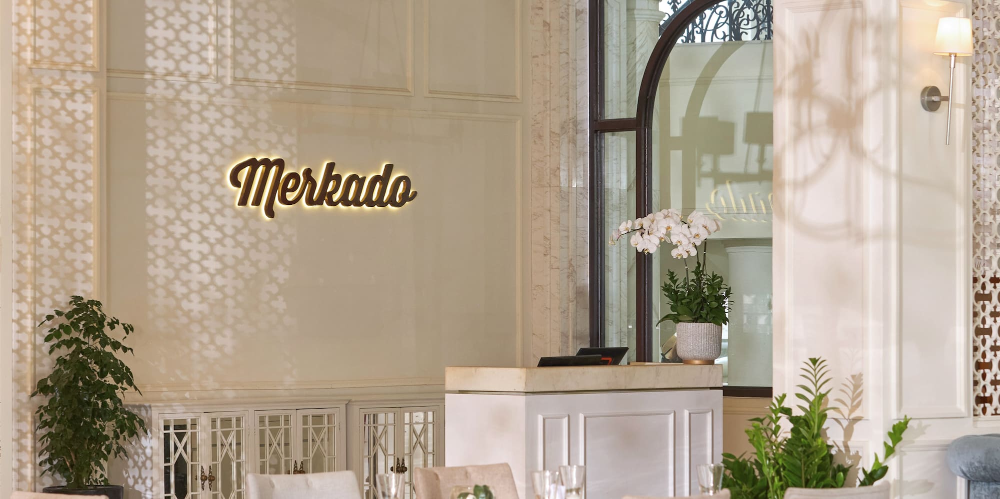 a room with tables and chairs