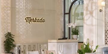 a room with tables and chairs