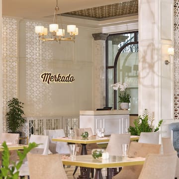 a room with tables and chairs