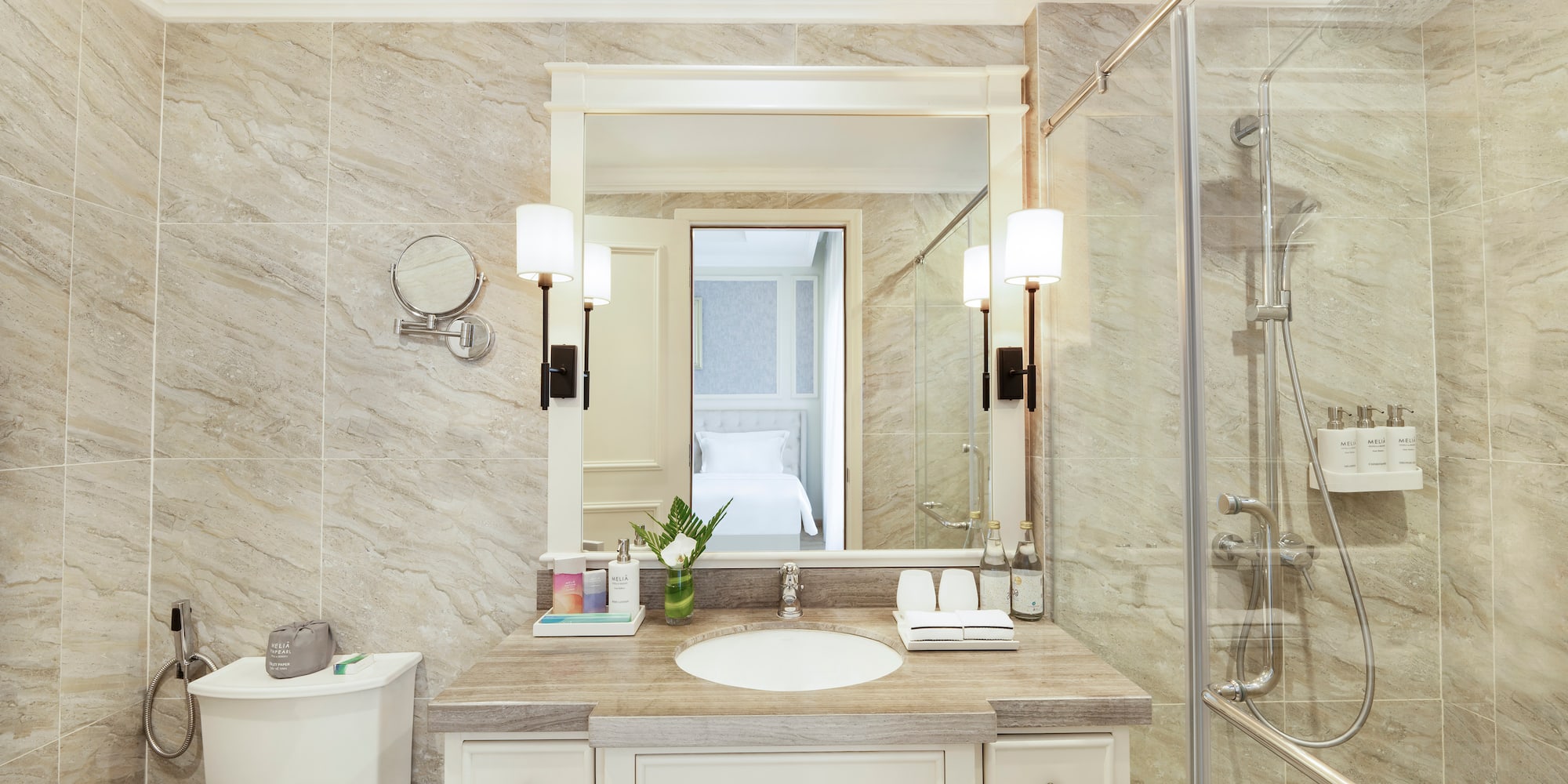 a bathroom with a mirror and sink