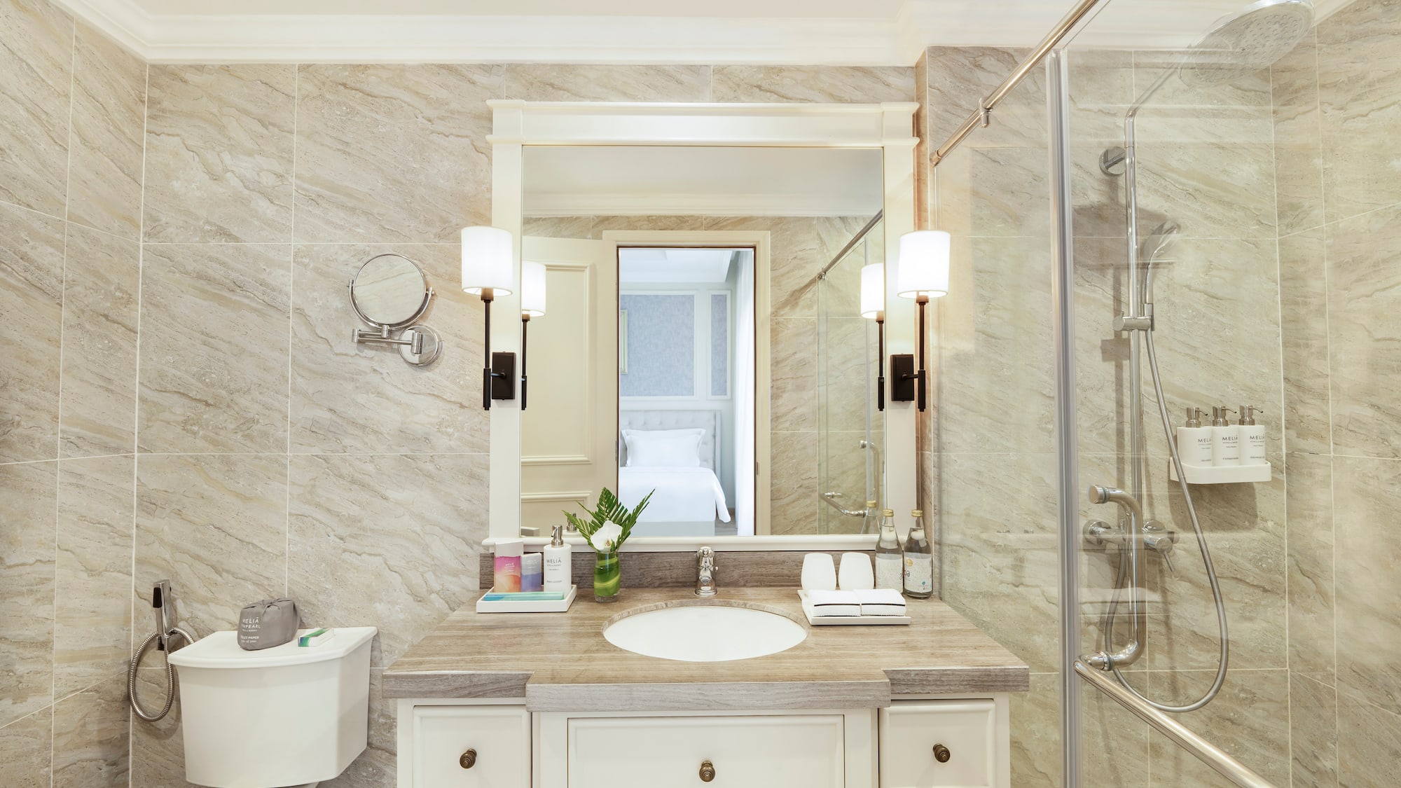 a bathroom with a mirror and sink