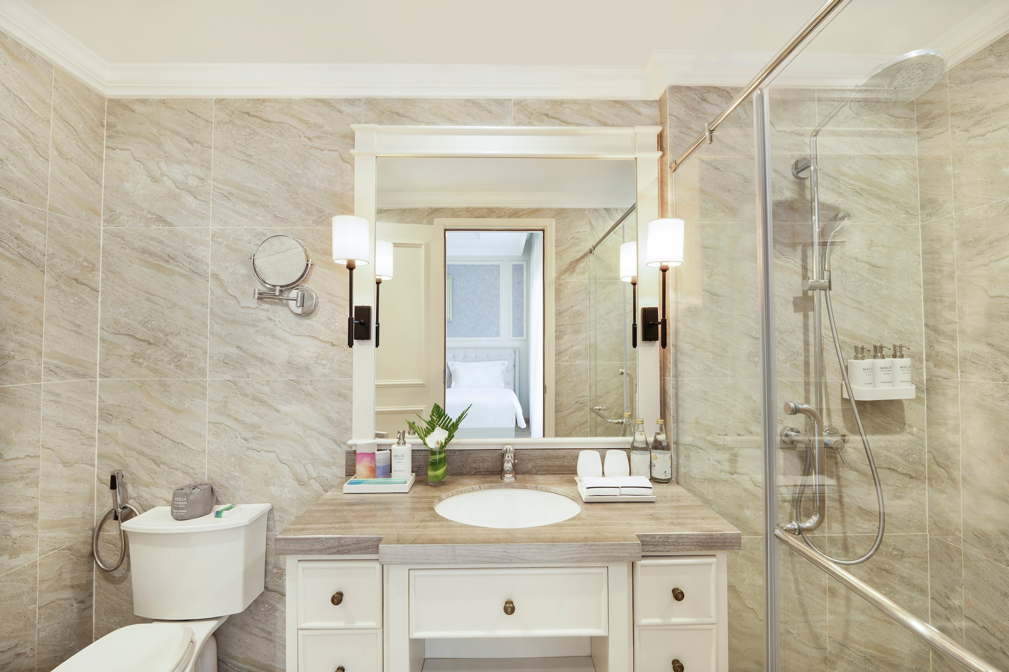 a bathroom with a mirror and sink