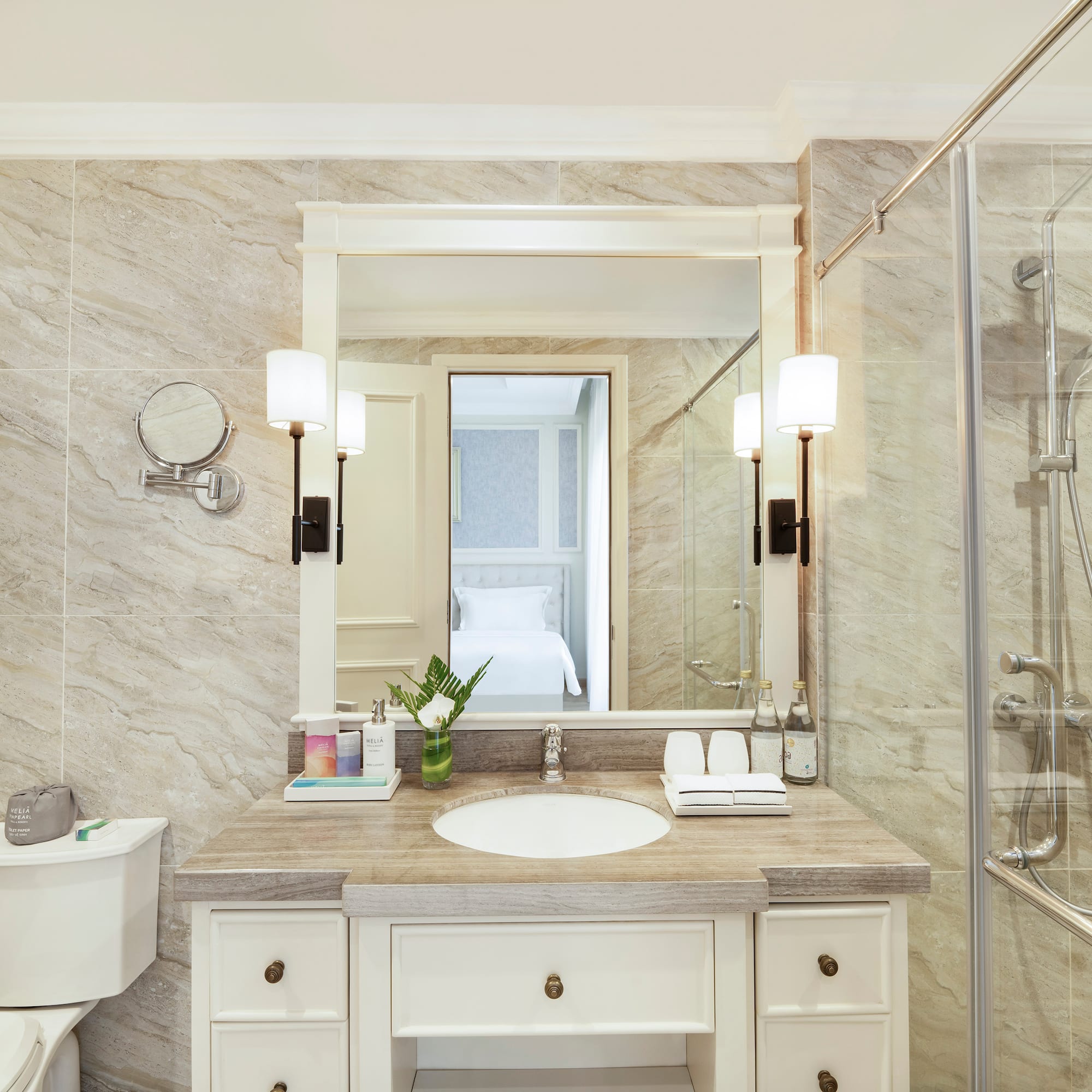 a bathroom with a mirror and sink