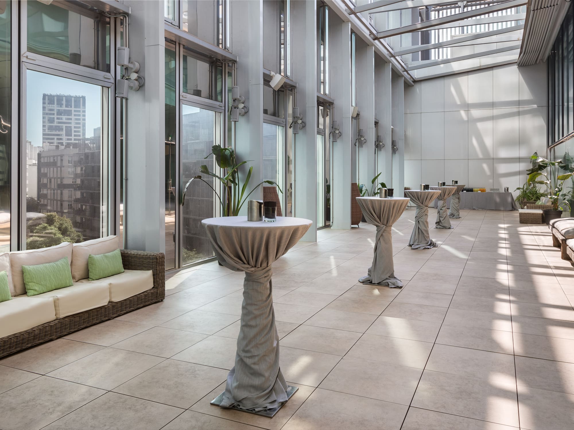 a long room with tables and chairs