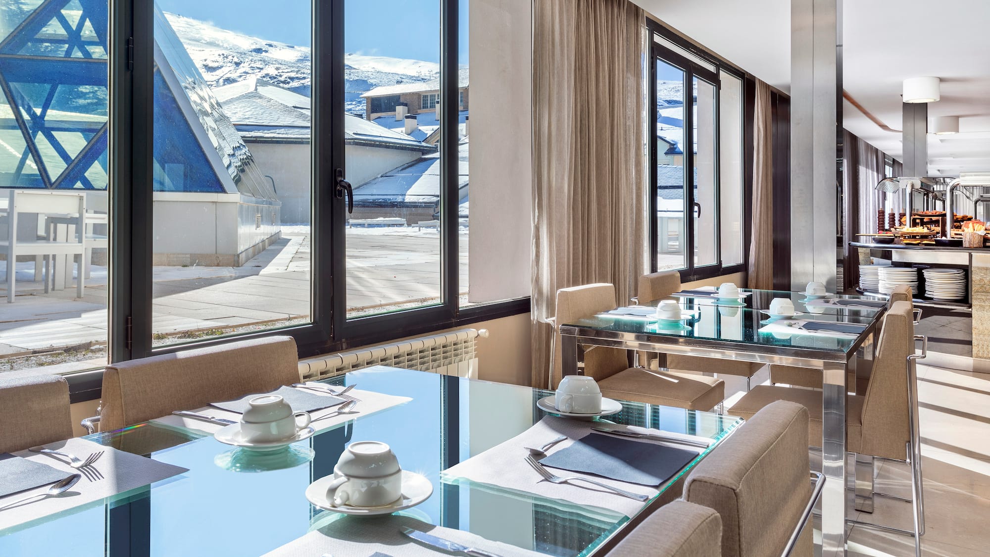 a room with a table and chairs