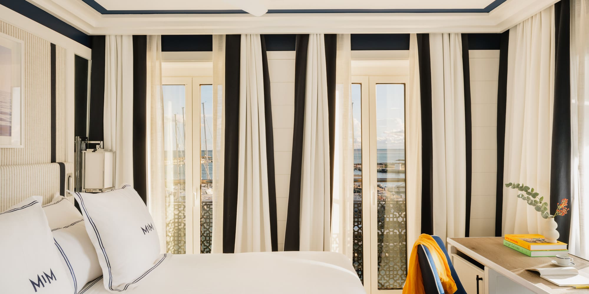 a room with a bed and a desk