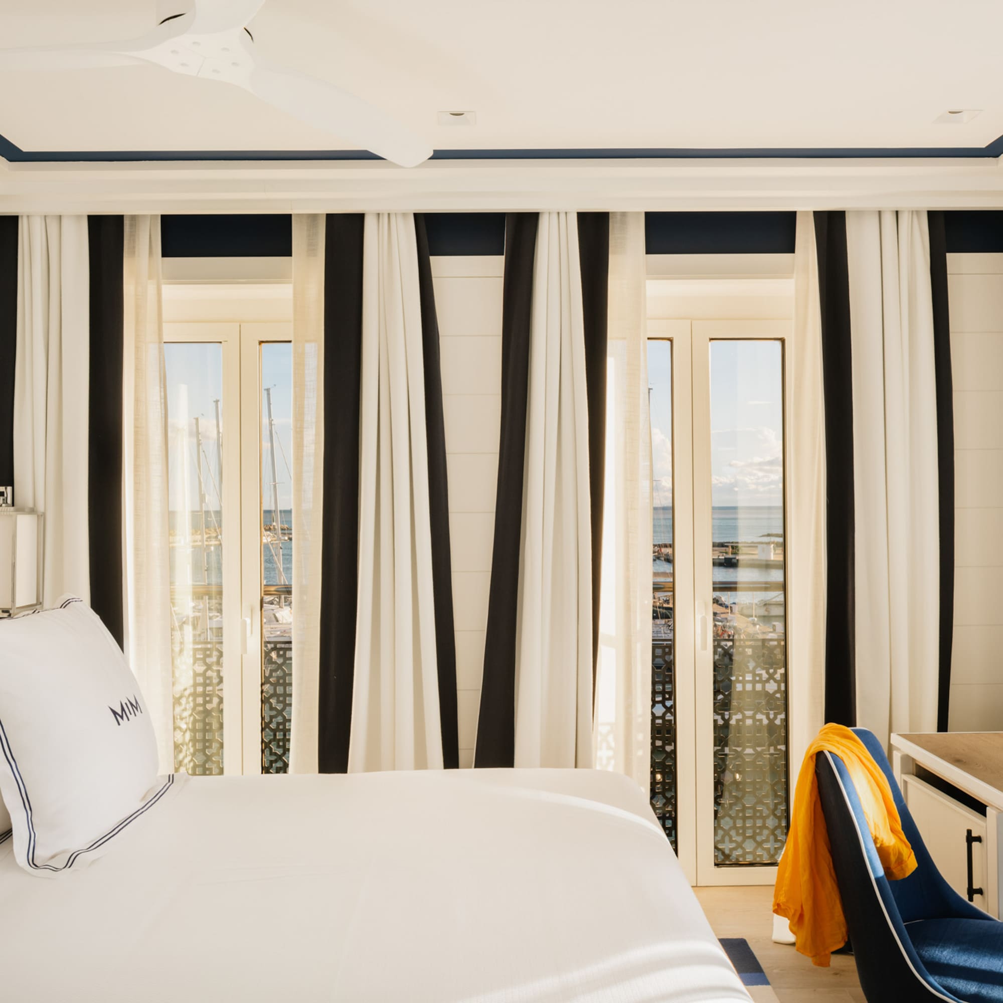 a room with a bed and a desk