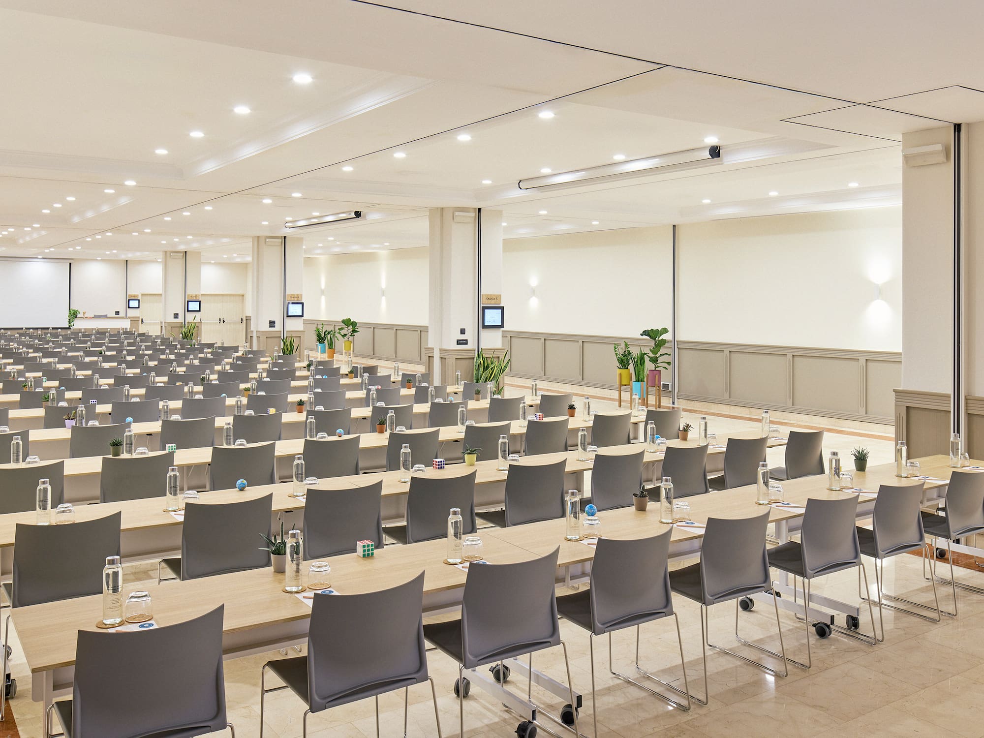 a large room with tables and chairs