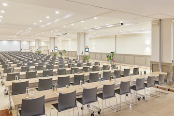 a large room with tables and chairs