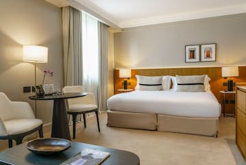 a room with a bed and a table