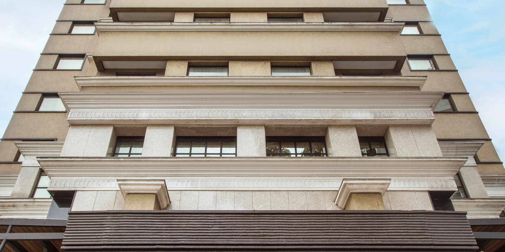 a tall building with a glass door