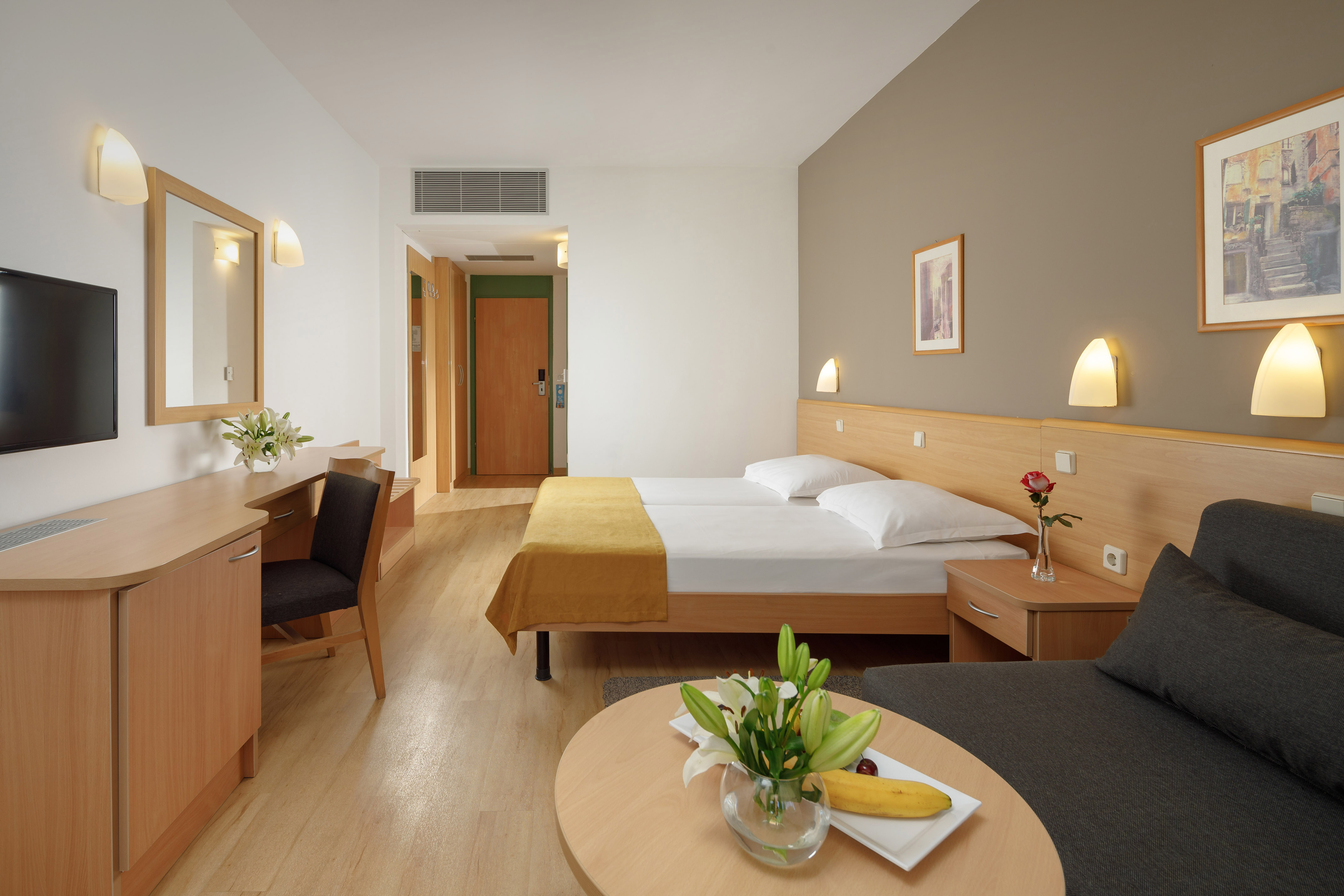 a room with a bed and a table