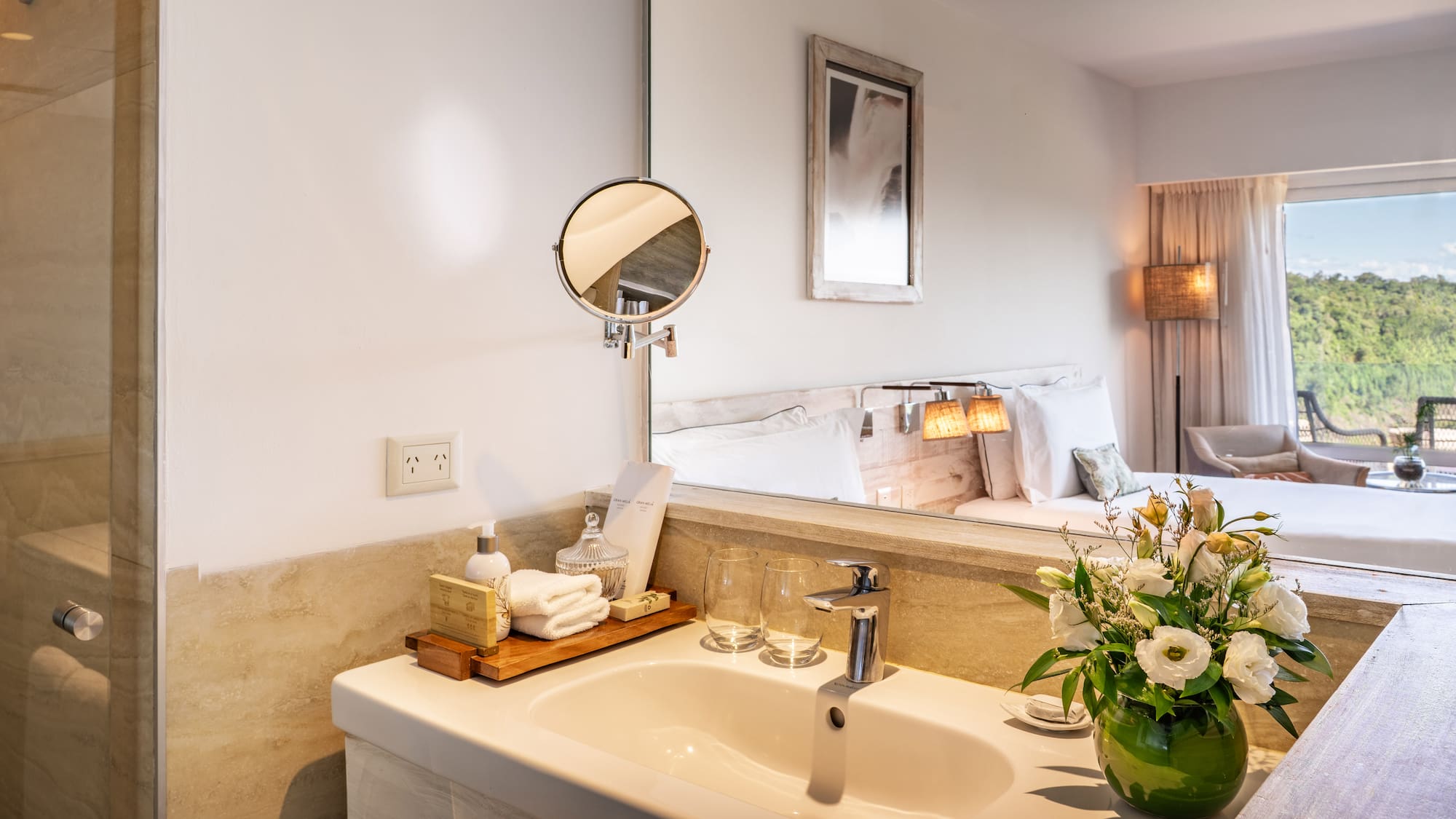 a bathroom with a mirror and a sink