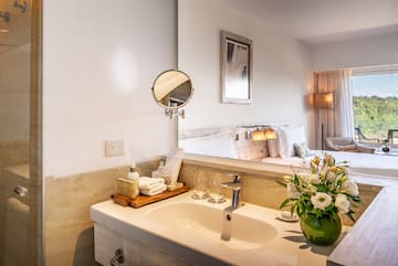 a bathroom with a mirror and a sink