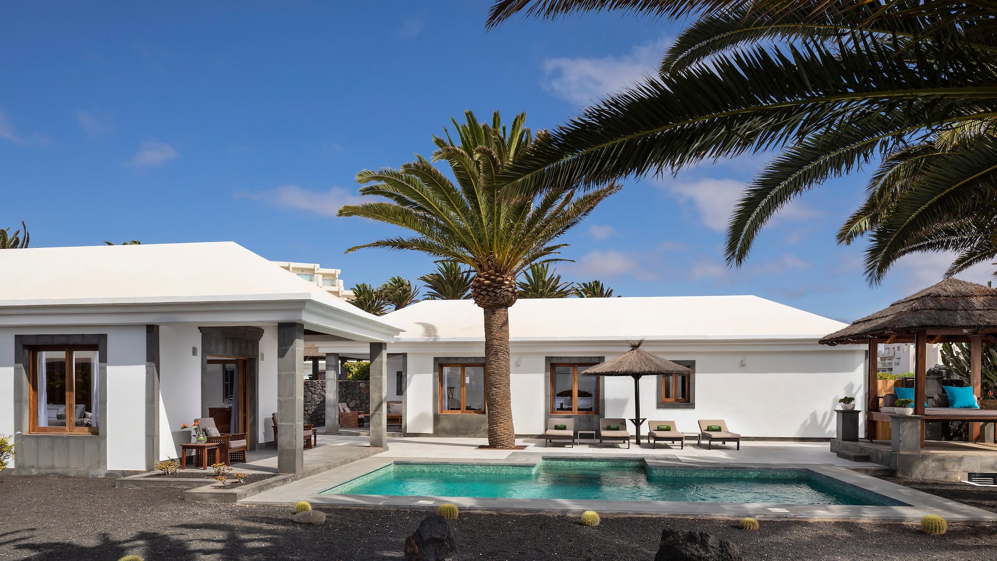 a swimming pool in a white house