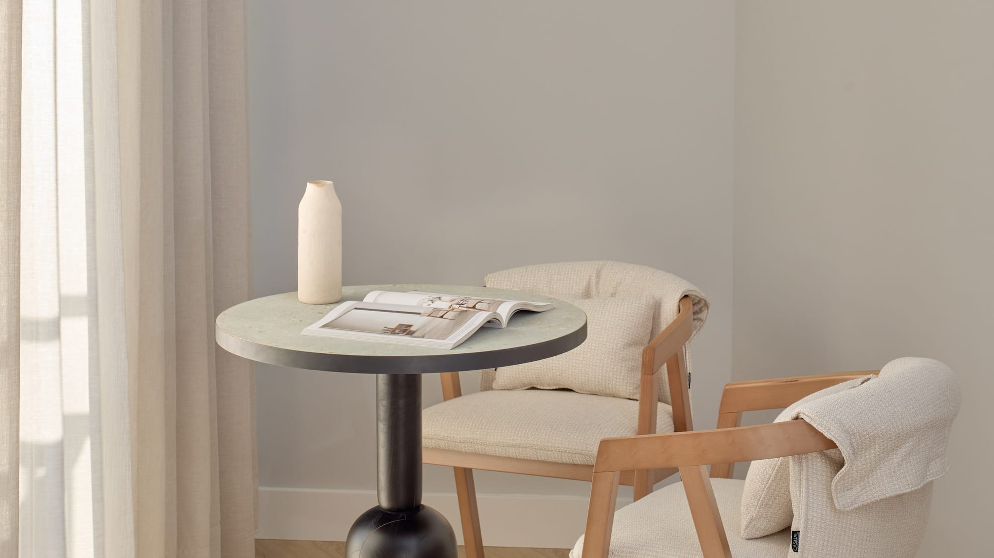 a table and chairs in a room