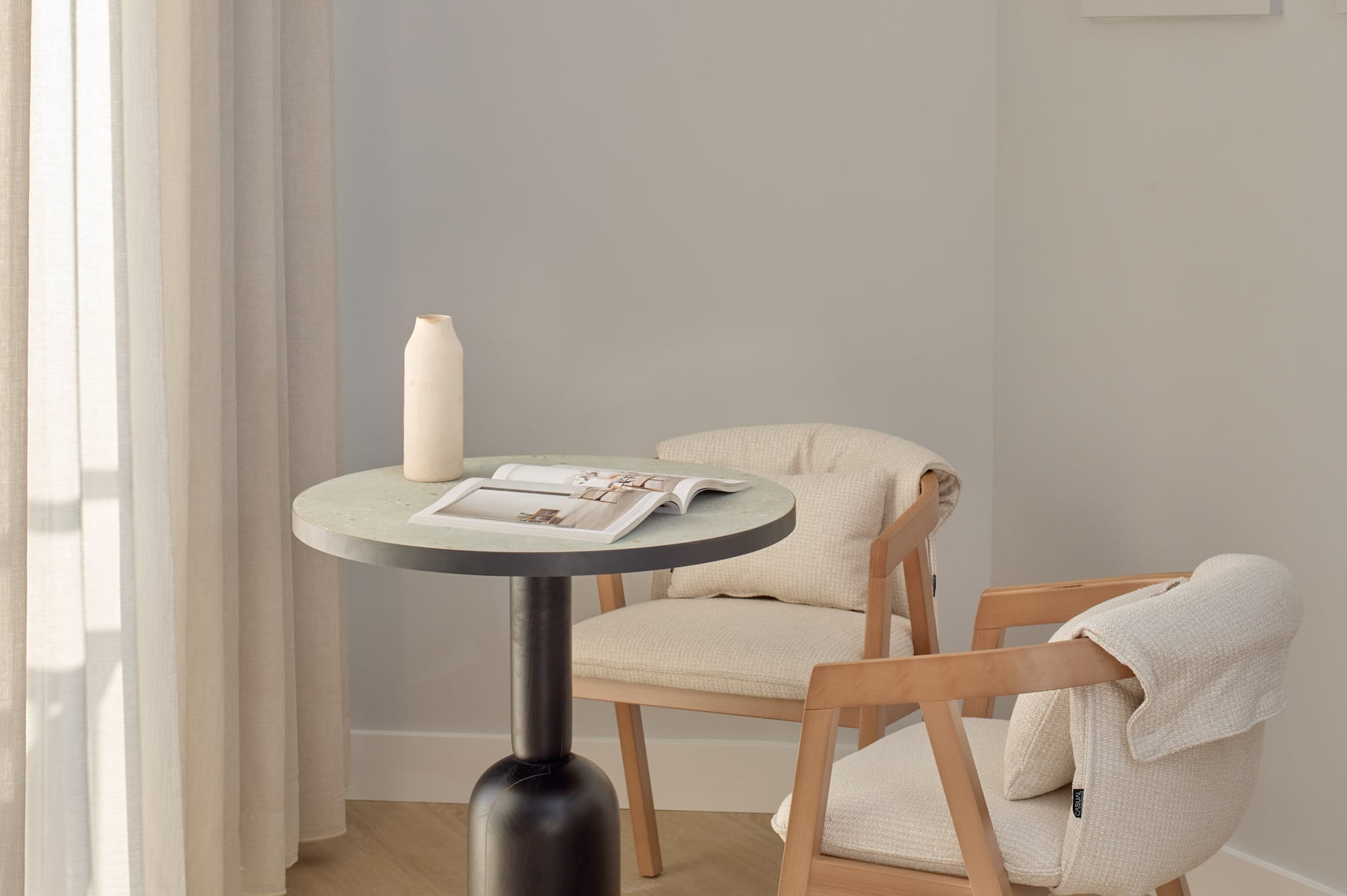 a table and chairs in a room