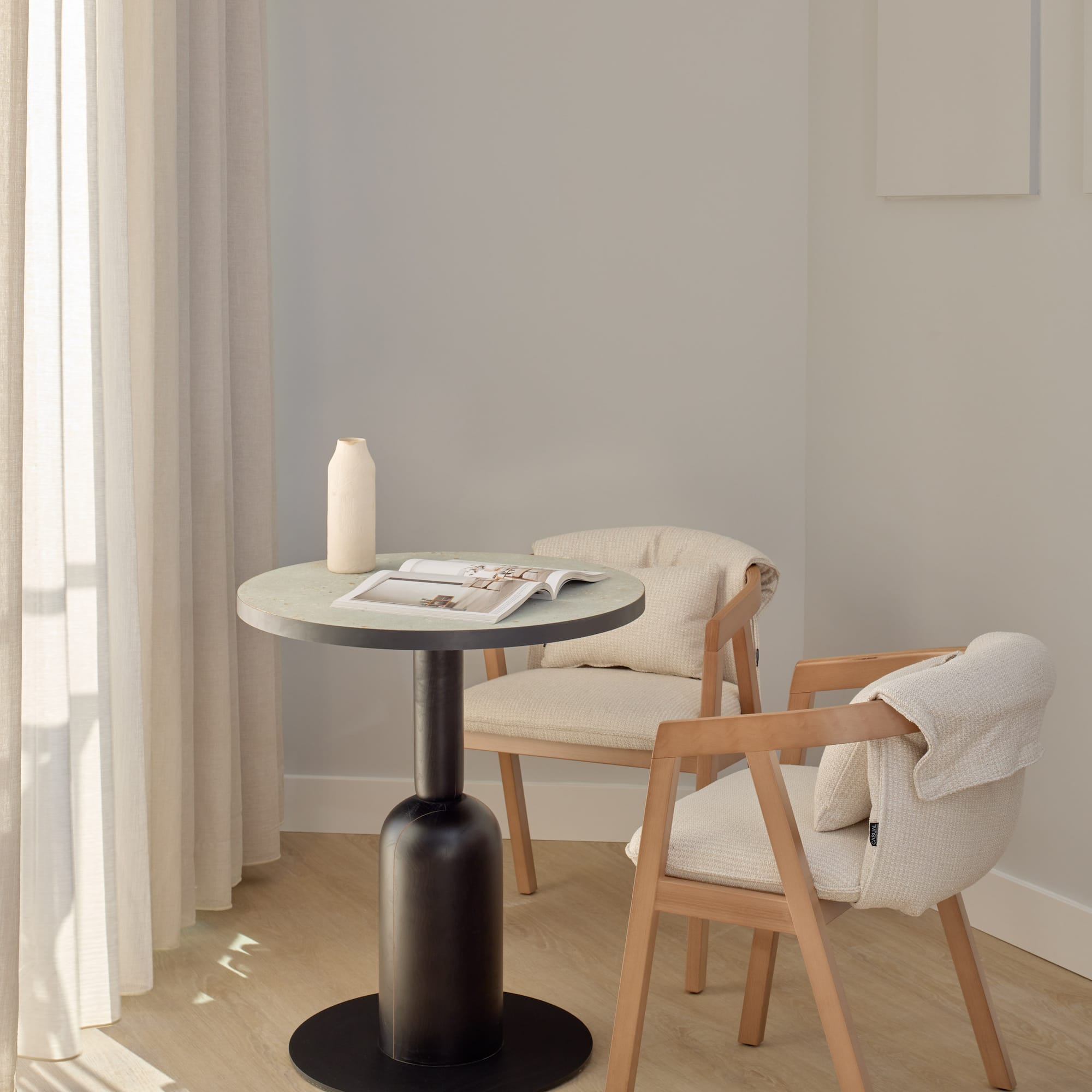 a table and chairs in a room